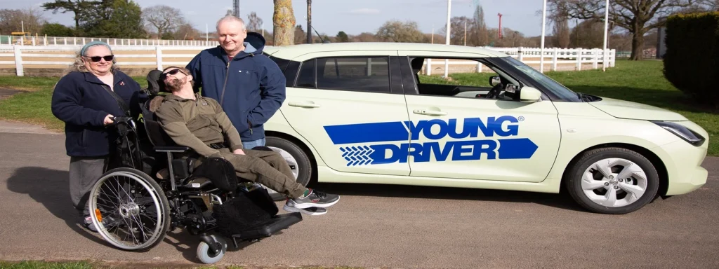 David Hopcroft with his parents at a Young Driver event